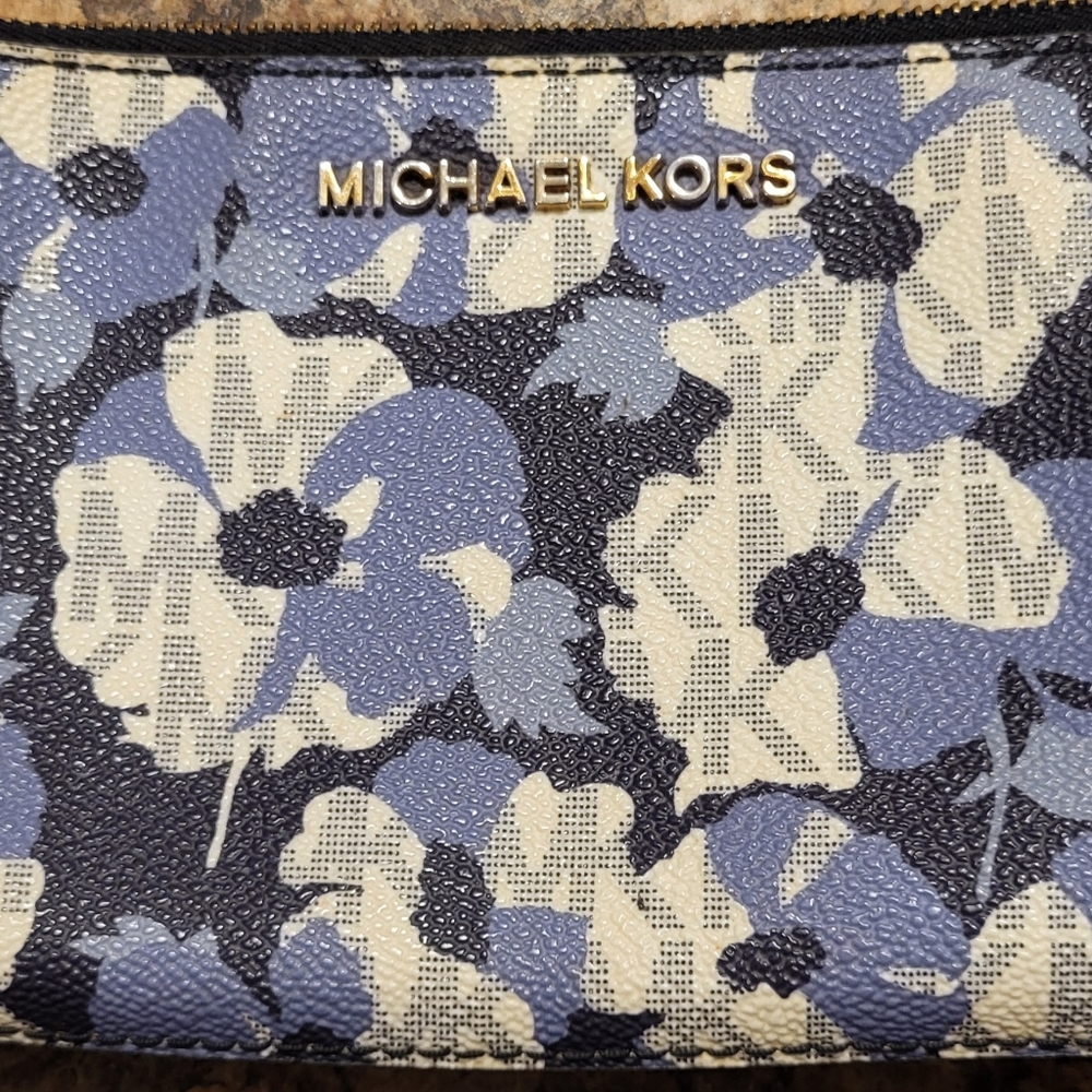 Michael Kors navy blue and white floral wristlet